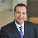 Robert T. Flores Managing Partner, Director of Disruptive Technology Research